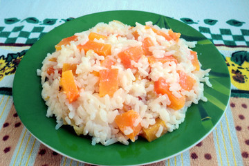 dairy rice porridge with pumpkin, dishes for children, Homemade            