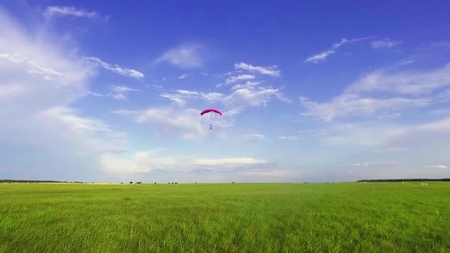 Skydivers landing