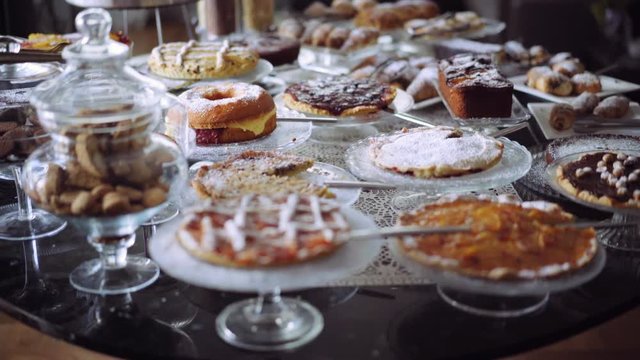 Table with morning coffee and croissant. Daily breakfast. Bakery products. Hotel's delicious,varied, breakfast of regional products!