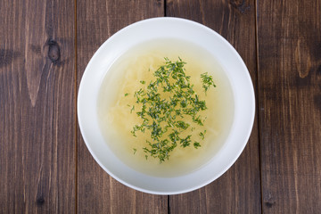 Yellow chicken noodles soup