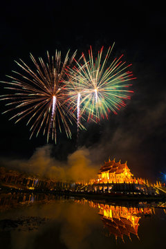 Fireworks celebrate the New Year 2018 at Rajapruek Royal Park, Chiang Mai with beutiful light of Hor Khum Luang temple,Thai Tradition Building