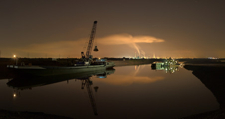 Dredger And Heavy Industry At Night