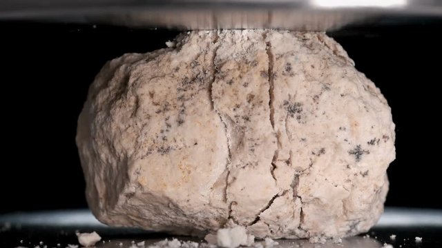 construction crushed stone is tested and tested on a hydraulic press, close-up
