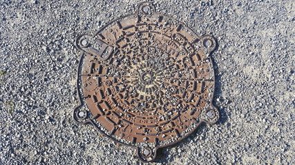 manhole on pavement