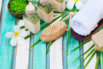 Spa and wellness massage setting. Still life with flower. Copy space. Top view.
