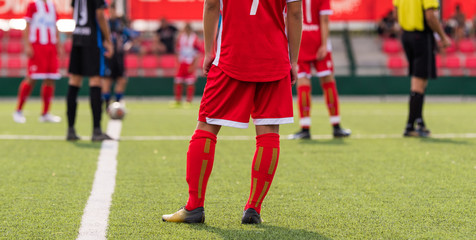 Obraz premium Young children player on the football match