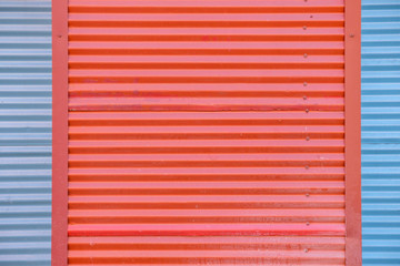 texture background of red and blue metal fences