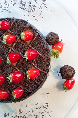 chocolate cake with stuffing and strawberries
