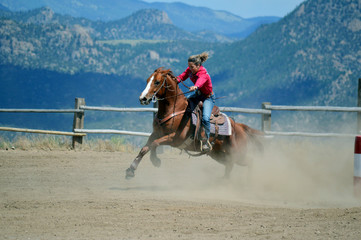 Cowgirl on Chestnut Horse Barrel Racing