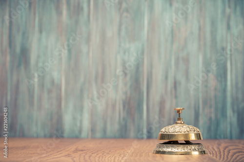 Vintage Bronze Hotel Reception Service Desk Bell Front Grunge Wooden Vintage Bronze Hotel Reception Service Desk Bell Front Grunge Wooden Wall Background Old Retro Style