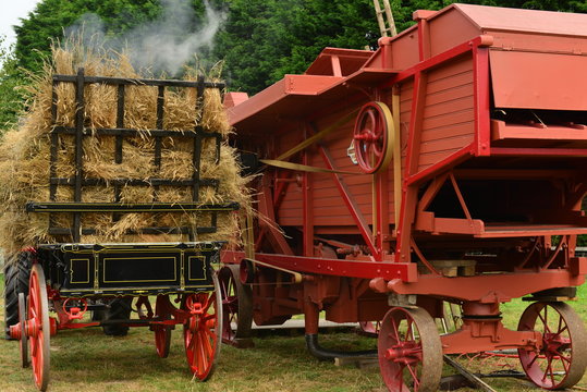 Agriculture from the past, Jersey, U.K.
Vintage thresher machine and horse cart .