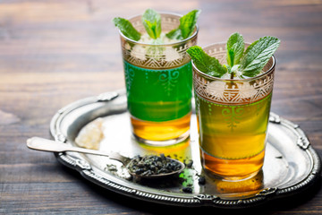 Mint tea, Moroccan traditional drink in glass. Copy space.