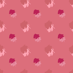 Seamless background pattern with various colored spots.
