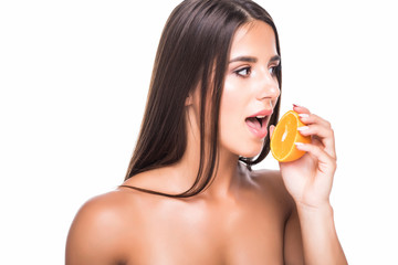 Vitality concept. Portrait of enjoyed appealing woman with citrus slices isolated on white background