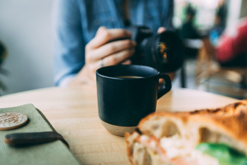 Photographer in Coffee Shop