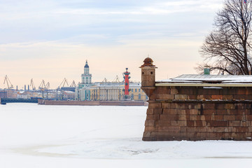 Wall of the Peter and Paul Fortress. View of the Vasilievsky Island in St. Petersburg in the winter.
