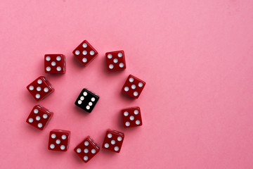 Red gaming dices on pink background. Flat lay, place for text. Game concept
