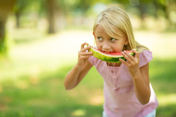 girl eating watermelon