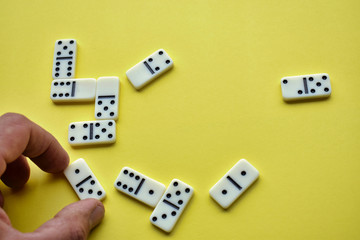 domino pieces on a yellow background