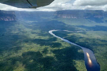 Naklejka na ściany i meble Aerial view of jungle from plane