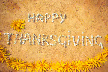 an inscription made of stones, a day of thanksgiving. The inscription on the sand..