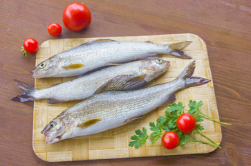 Fresh grayling, a family of salmon. Fresh fish on the table.