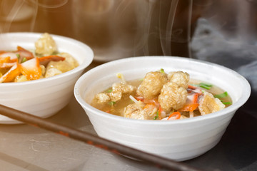 Noodle soup in bow foam one of street food is popular tourist fast food,Thailand