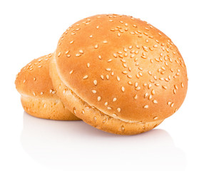 Two hamburger buns with sesame isolated on white background