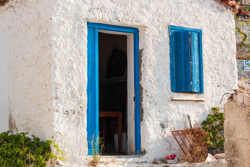 old house with blue window and door 