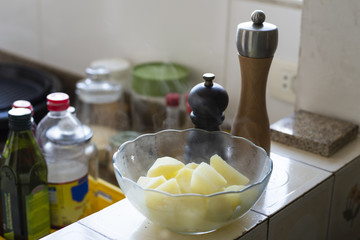 person holding a can of hot potatoes, coming out smoke