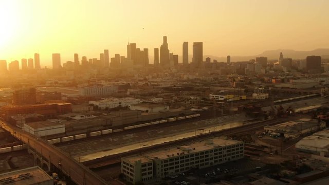 Aerial Shot of Los Angeles Downtown Sunset Skyline and 7th Bridge