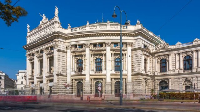 Vienna,  Austria, Burgtheater on a summer sunny day. Time lapse. Zoom out effect