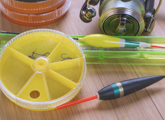 Fishing tackle on a wooden table © liga258