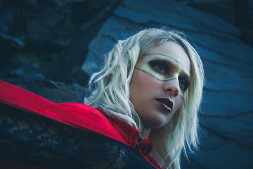 Super heroine with red cape