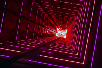 Elevator corridor in the building lit by red elumination. Futuristic elevator shaft is located in a...