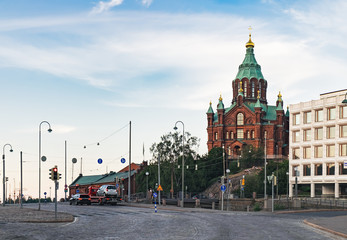 Uspenski Orthodox Cathedral Church in Katajanokka district of the Old Town at summer evening, Helsinki, Finland. View from Meritullintori Street