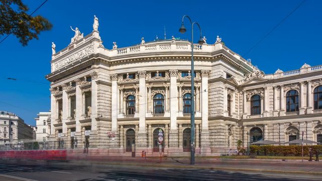 Vienna,  Austria, Burgtheater on a summer sunny day. Time lapse