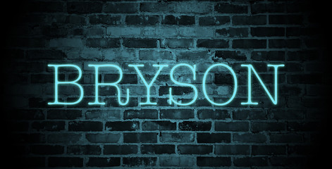 first name bryson in blue neon on brick wall