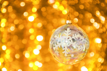 Christmas glass ball on bokeh background.