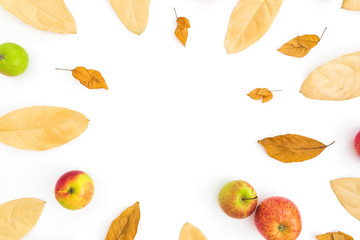 Autumn frame of fall leaves and apples on white background. Thanksgiving day. Flat lay, top view