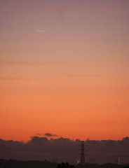 Tokyo,Japan-September 9, 2018: The new moon and Mercury with a silhouette of Tokyo Tower
