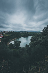 Landscape with the river on cloudy day