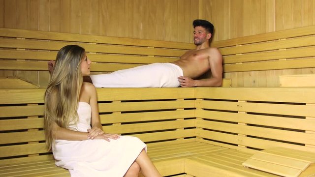 Couple talking in a sauna