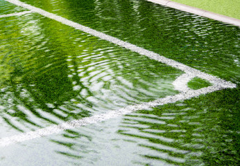 Flooding in artificial grass football field