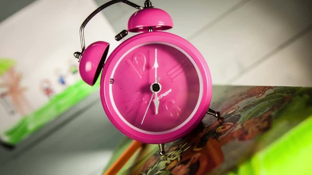 Time lapse clock - camera rotates with big hand of a clock from 07:00-08:00