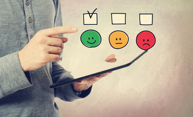 Survey with man holding a tablet computer