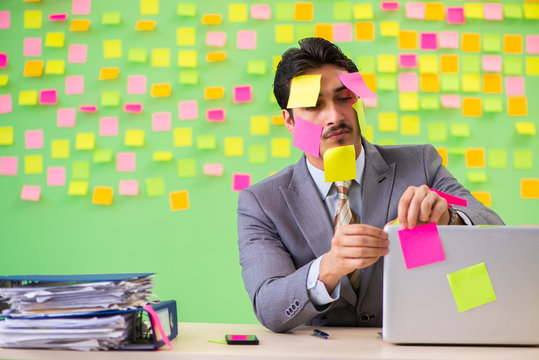 Businessman with many conflicting priorities   