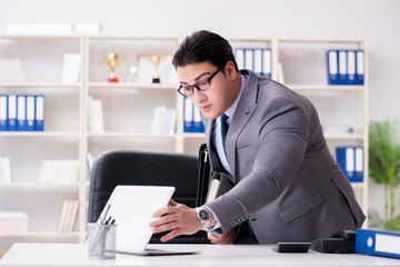 Fototapeta premium Businessman in industrial espionage concept