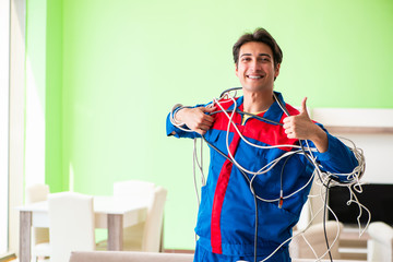 Electrician contractor with tangled cables