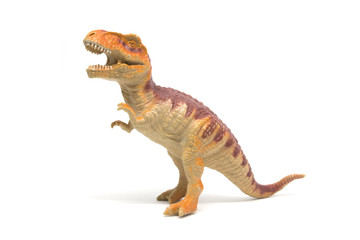 Plastic Tyrannosaurus toy isolated on white background